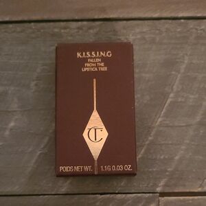 Charlotte Tilbury K.I.S.S.I.N.G Lipstick Box in Brown and Gold